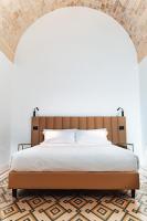 Łóżko lub łóżka w pokoju w obiekcie Le Vie Del Centro Luxury Room