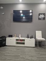 TV a/nebo společenská místnost v ubytování Habitaciones boutiques