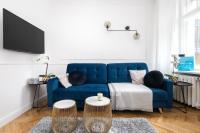 Televízia a/alebo spoločenská miestnosť v ubytovaní Mokotowska 51 - Stylish Apartment by Noclegi Renters