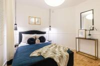 Posteľ alebo postele v izbe v ubytovaní Mokotowska 51 - Stylish Apartment by Noclegi Renters