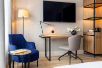 TV a/nebo společenská místnost v ubytování NH Amsterdam Leidseplein
