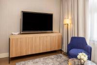 TV a/nebo společenská místnost v ubytování NH Amsterdam Leidseplein