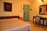 Łóżko lub łóżka w pokoju w obiekcie Hotel Tortorina