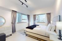 Postel nebo postele na pokoji v ubytování East Heights Tower B - Modern One Bedroom in Business Bay