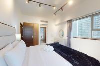 Postel nebo postele na pokoji v ubytování East Heights Tower B - Modern One Bedroom in Business Bay