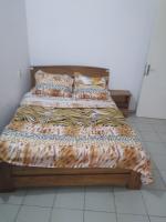 Le TOUNKARANKE residence FASSO KANU- villa-にあるベッド