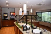 a food counter in a restaurant with a buffet at Staybridge Suites Syracuse Liverpool by IHG in Liverpool