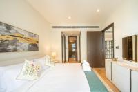 Postel nebo postele na pokoji v ubytování Luton Vacation Homes - Tranquil 2BR Haven in the Heart of Dubai Marina- 28AB04