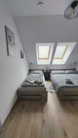 Postel nebo postele na pokoji v ubytování Apartmán Štěpa