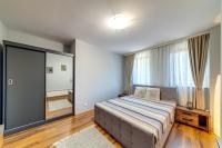 Postel nebo postele na pokoji v ubytování Luxury Flat in Grand Resort Pamporovo by Flat Mаnager