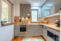 Kuchyň nebo kuchyňský kout v ubytování Luxury Flat in Grand Resort Pamporovo by Flat Mаnager