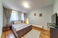 Postel nebo postele na pokoji v ubytování Luxury Flat in Grand Resort Pamporovo by Flat Mаnager