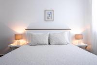 Posteľ alebo postele v izbe v ubytovaní New cosy apartments with private parking