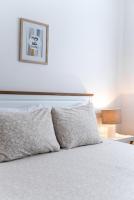 Posteľ alebo postele v izbe v ubytovaní New cosy apartments with private parking
