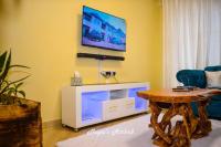 Mupa's Luxury Condo IIにあるテレビまたはエンターテインメントセンター