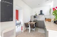 A cozinha ou cozinha compacta de Maison cosy Paris Orly jardin priv&eacute;e