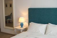 Postel nebo postele na pokoji v ubytování Villa Quisisana Taormina