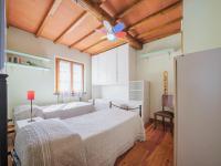 Posteľ alebo postele v izbe v ubytovaní Holiday Home L'Aia by Interhome