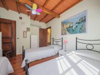 Posteľ alebo postele v izbe v ubytovaní Holiday Home L'Aia by Interhome