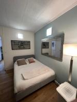 Posteľ alebo postele v izbe v ubytovaní Charmante Maison centre deauville