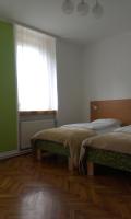 Posteľ alebo postele v izbe v ubytovaní Guest House Villa Herbarium