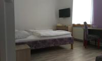 Posteľ alebo postele v izbe v ubytovaní Guest House Villa Herbarium