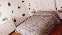 A bed or beds in a room at Casita el Parral