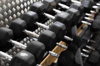 a bunch of dumbbells in a gym at Residence Inn by Marriott Paris Didot Montparnasse in Paris