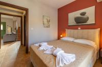 Postel nebo postele na pokoji v ubytování "Villa ANDREAS"