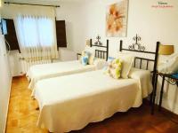 Postel nebo postele na pokoji v ubytování Hotel Rural Alfajía de Antonio