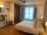 Postel nebo postele na pokoji v ubytování Hotel Rural Alfajía de Antonio