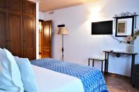 Postel nebo postele na pokoji v ubytování Hotel Rural Alfajía de Antonio