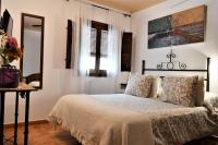 Postel nebo postele na pokoji v ubytování Hotel Rural Alfajía de Antonio