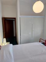 Postel nebo postele na pokoji v ubytování Residence Casa Pineta