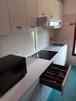Kuchyň nebo kuchyňský kout v ubytování Residence Casa Pineta
