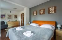 Postel nebo postele na pokoji v ubytování Rent like home - Pardałówka VI