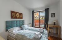 Postel nebo postele na pokoji v ubytování Rent like home - Pardałówka VI