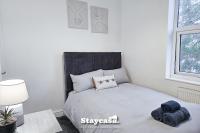 Postel nebo postele na pokoji v ubytování Charming 6-bed Near Alexandra Park - Free Parking