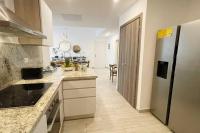 Kuchyň nebo kuchyňský kout v ubytování Apartamento de 2 Dormitorios en Hard Rock Golf