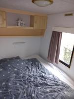 De Boerenskuur..chalet..にあるベッド