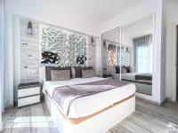 A bed or beds in a room at Getares Beach