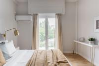 Posteľ alebo postele v izbe v ubytovaní Zeus Temple view 2BD Apartment by UPSTREET