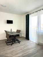 TV a/nebo společenská místnost v ubytování Sky Apartments 502