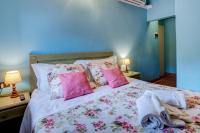 Posteľ alebo postele v izbe v ubytovaní Albergo Villa San Michele
