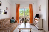 Televízia a/alebo spoločenská miestnosť v ubytovaní Apartamento Mediterraneo 105