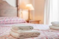 A bed or beds in a room at Can Faveta