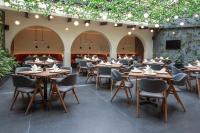 Veitingastaður eða matsölustaður á Amberes 64, an Ascend Collection Hotel