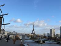 a view of the eiffel tower from a bridge at Appartement vue Tour Eiffel paris 16 Eme in Paris