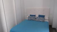 A bed or beds in a room at Apartamentos Ilíberis