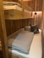 Posteľ alebo postele v izbe v ubytovaní Chalet Apart Hansler